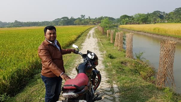 Road created with excavation material from drainage canal in coastal Bangladesh