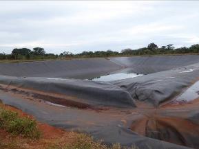 Borrow pit lined with geotextile, Mozambique