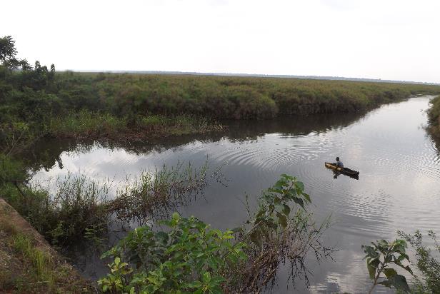 Water in canal controlled by gates on the culvert, Uganda